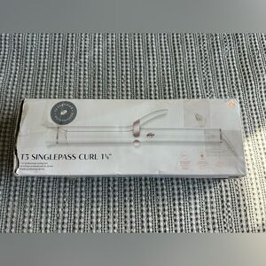 T3 Single Pass 1 1/4 inch curling iron. Comes with original box. See photos.